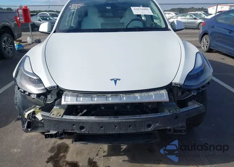 2023 Tesla Model Y Awd/Long Range Dual Motor All-Wheel Drive z USA, uszkodzony, nr VIN 7SAYGAEE4PF856425